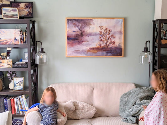 Horeb, an original mixed media painting by Tara Shoemaker art, hanging above a couch with two little girls with obscured faces