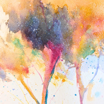 Abstract watercolor painting with splashes of color on a white background