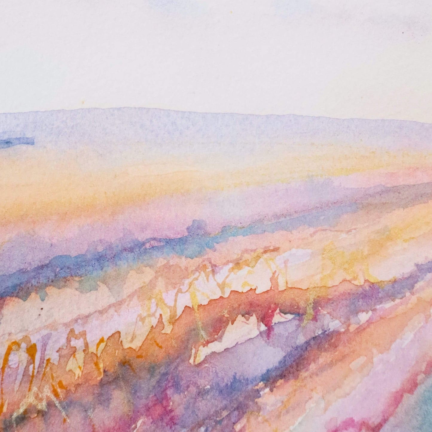 Watercolor painting of a landscape with soft, pastel colors