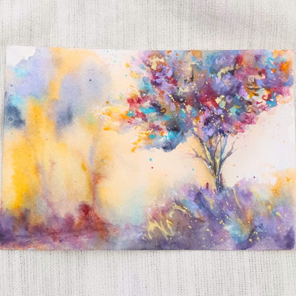 Colorful abstract painting of a tree on a textured fabric background. Eden by artist Tara Shoemaker.