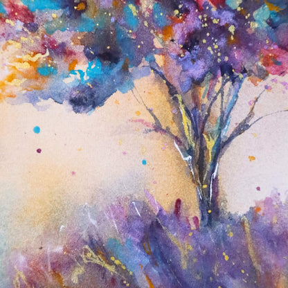 Colorful abstract painting of a tree with a soft golden background
