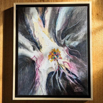 Video zooming in on an abstract painting with a colorful tree and swirling light and dark designs.